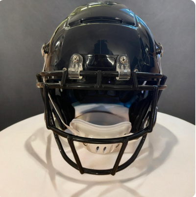 Schutt F7 VTD Navy Blue football helmet — front view with facemask